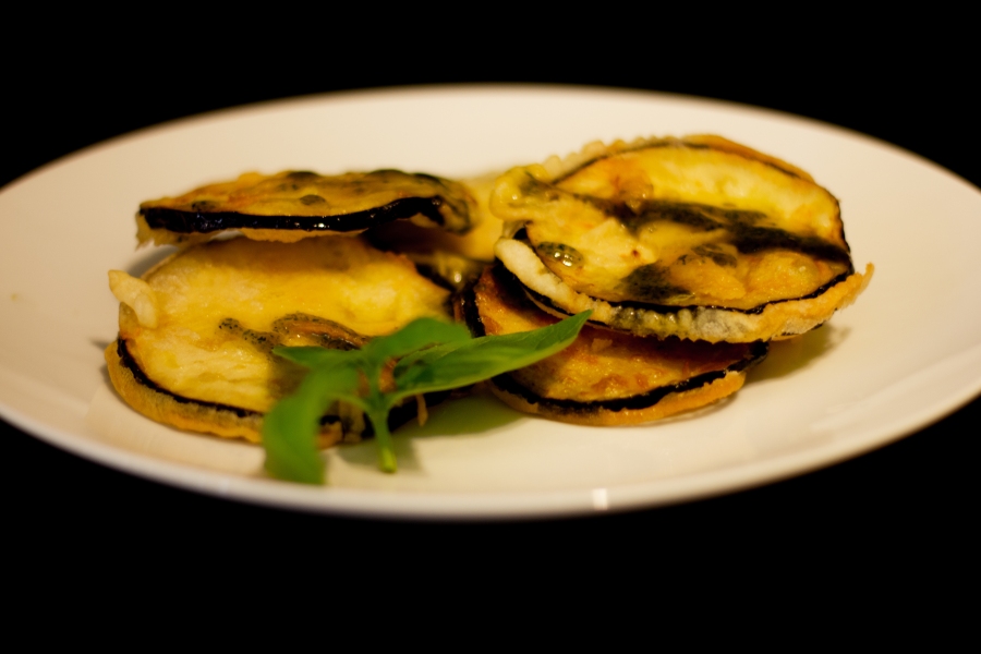 TAPAS – Fried aubergine with a honey and basil dressing.