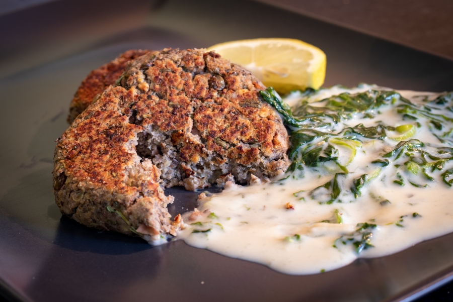 Lentil, Black eye bean and Mushroom patty, with a spinach and coconut cream sauce (vegan)